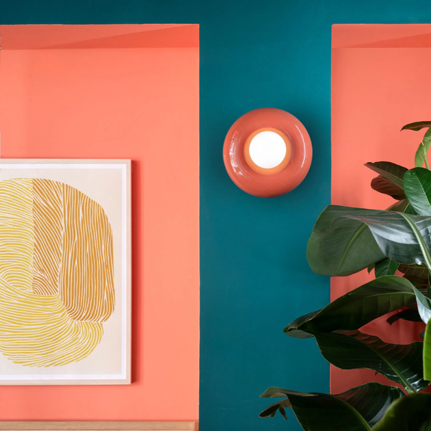 Vibrant Playful Ceramic Wall Light | Lighting Collective | orange in a colourful living room