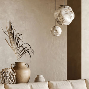 Refined Textured Glass Pendant group of two lights in a living room with a meditarrenean style