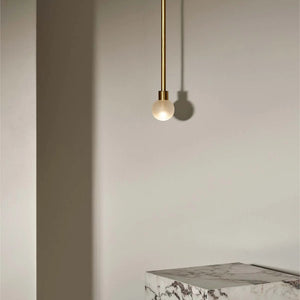 Minimalist Metal and Glass Spherical Pendant Solid Rod small brass and clear frosted lit up