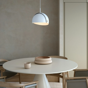 Adjustable Matte Metal Dome Pendant white finish over a dining table