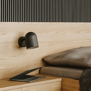 Adjustable Modern Bell Wall Light displayed as a bedside lamp