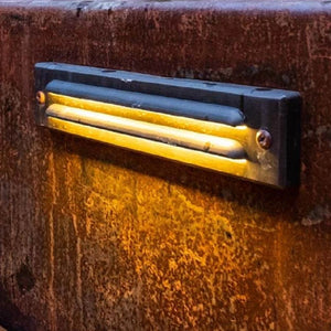 Sleek Rectangular Brass Grooved Step Light