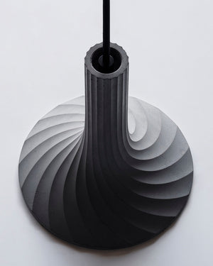 Black and gray spiral design on a white background