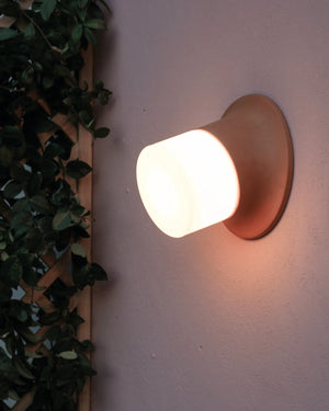 Button Wall Light Installed outdoors light on