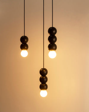 A cluster of Modern Lava Oops Pendant lights