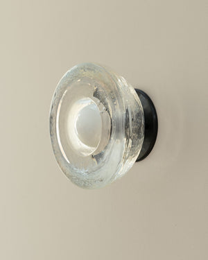 Cast glass wall light