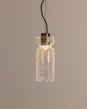 Glass crackle pendant light with textured design on a neutral background