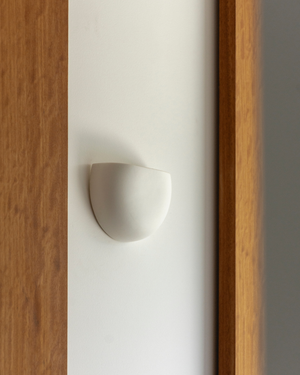 Crescent Wall Sconce on a light background