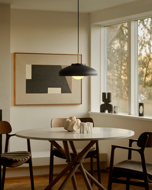 Danish Metal & Glass Pendant Light over a dining table