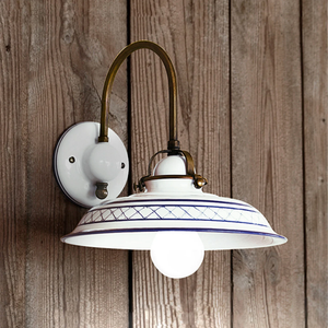 Decorative White Ceramic Wall Light | Lighting Collective | on a wooden wall