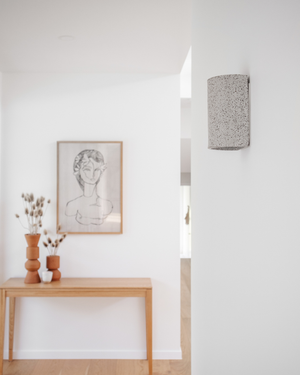 Handmade Speckled Ceramic Wall Light | Dusk in a hallway