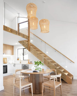 Handwoven Banana Leaf Pendant | Bindu | Lighting Collective | Pendants Suspended Above Dining Table in Void Area