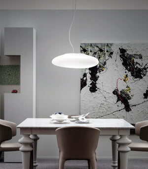 Contemporary Matte Glass Pendant Light over a dining table