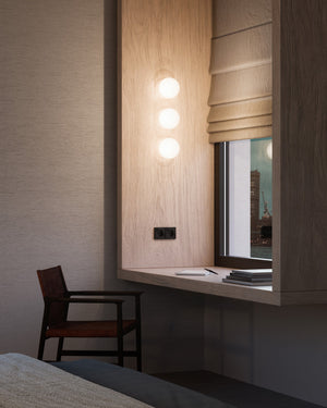 Minimalist Sphere Wall Light Installed on a timble wall of a study nook