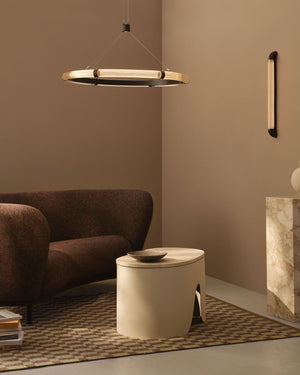 Ribbed Glass Circular Suspended Pendant suspended in a lounge room