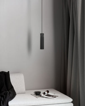 Slim Scandinavian Metal & Wood Pendant in Modern Clean Styled Interior above a cream couch - Lighting Collective 
