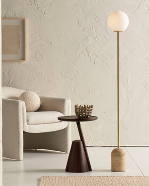 Minimalist Orb Travertine Floor Lamp in a living area