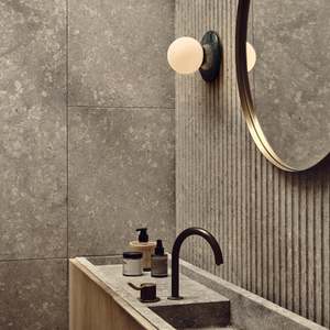 Natural Stone Orb Wall Light | Lighting Collective | green marble in a bathroom