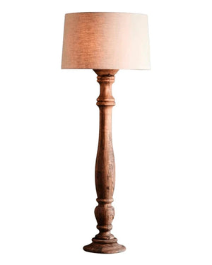 Wooden floor lamp with a beige lampshade on a white background
