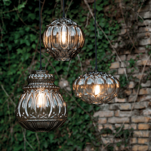 Outdoor Sculptural Glass Pendant | Lighting Collective | smoked three shapes in a patio