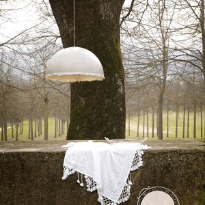Outdoor White Fibreglass Semi-Sphere Pendant | Lighting Collective | in nature in a garden