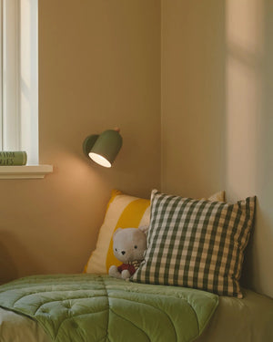 Pastel Nordic Adjustable Wall Light finished in Green featured in a children's room - Lighting Collective  