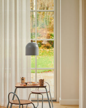 Blue Pastel Nordic Pendant suspended within a children's area | Lighting Collective