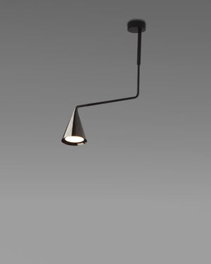 Modern pendant light with black arm and cone-shaped shade on a gray background