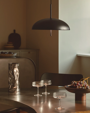 Scandinavian Wide Dome Pendant | Lighting Collective | small black in a dining room