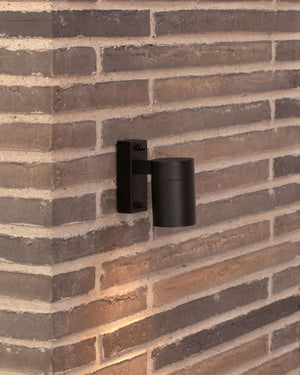 Black Modern Modern Wall Light on Brick Wall 