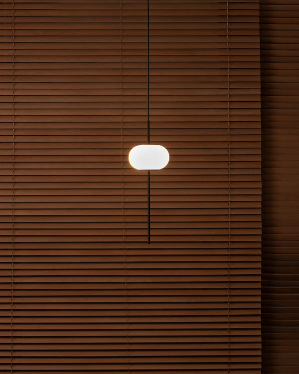 Timeless Glowing Oval Pendant Light