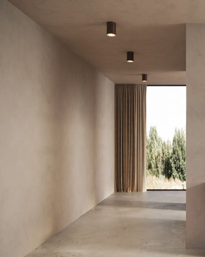 Wobbly Ceramic Ceiling Light | Slate In a hallway