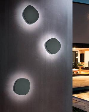 Backlit wall lights on a dark wall