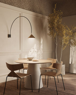 Arc Line Wall Light over a dining table | Lighting Collective