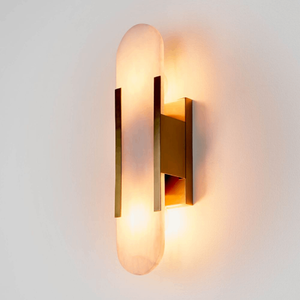 Brushed Gold and Alabaster Oblong Wall Light | Lighting Collective | turned on