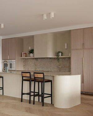 Indented ceramic lights styled in a warm modern kitchen