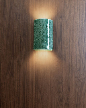 Short curved ceramic wall light in pickled olives finish