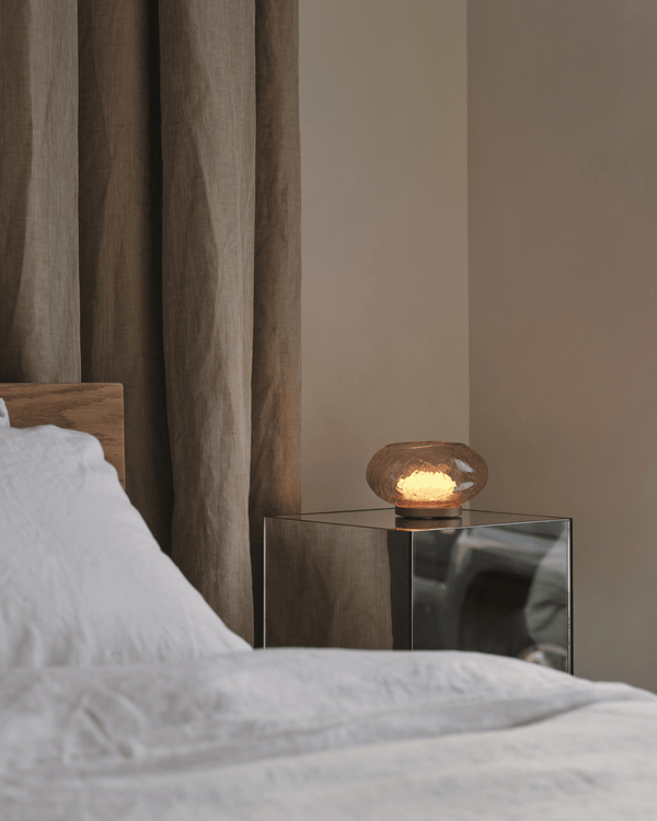 Alchemy Glass Table lamp in a modern bedroom by Adesign Studio and Sarah Ellison