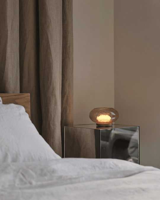 Alchemy Glass Table lamp in a modern bedroom by Adesign Studio and Sarah Ellison