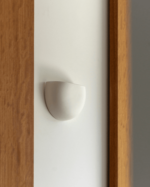 Crescent Wall Sconce on a light background