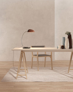 Curved Indirect Table Lamp on an office desk