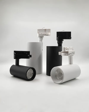 Set of track lights in black and white on a gray background