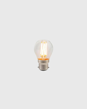 Clear light bulb on a white background
