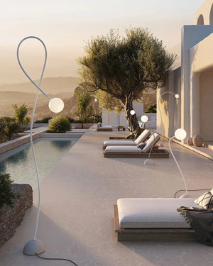 Exterior Minimalist Flexible Arm Orb Floor Lamp modern outdoor setting by a pool