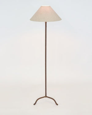 Farmhouse bronze floor lamp with warm down light in a white studio background