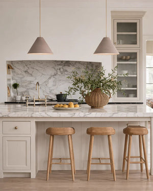 Beige cone pendants styled in a contemporary kitchen
