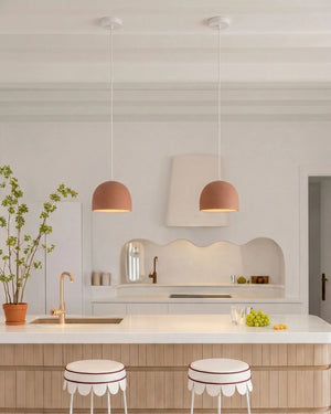 Terracotta pendants styled in a playful kitchen