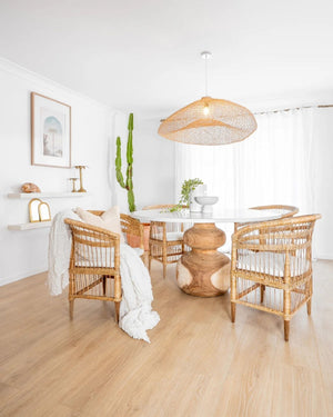 Handwoven Rattan Pendant Shade | Kibuyu | Lighting Collective | Pendant in Dining Room Suspended Above Table