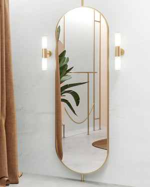 Italian Made Brass Up & Down Wall Lights displayed on both sides of a large mirror