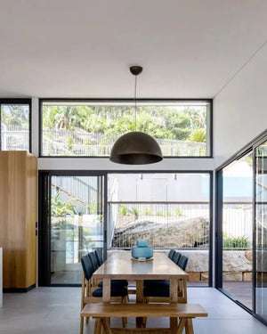 Modern italian made pendant hanging in a kitchen and dining area in Palm Beach, Gold Coast
